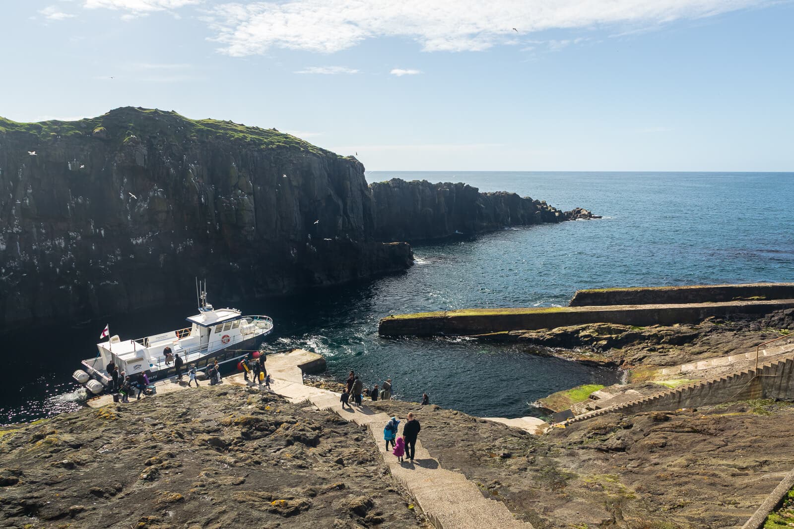 Passengers arriving at Mykines harbor