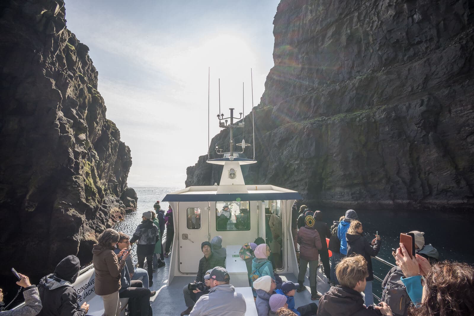 Boat navigating through the cliffs